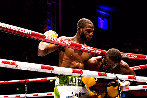 two men in the boxing ring
